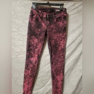 Pink and black acid wash jeans size 3